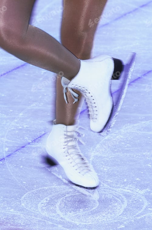 Preview: Blurred View Of A Woman Skating With White Ice Skates