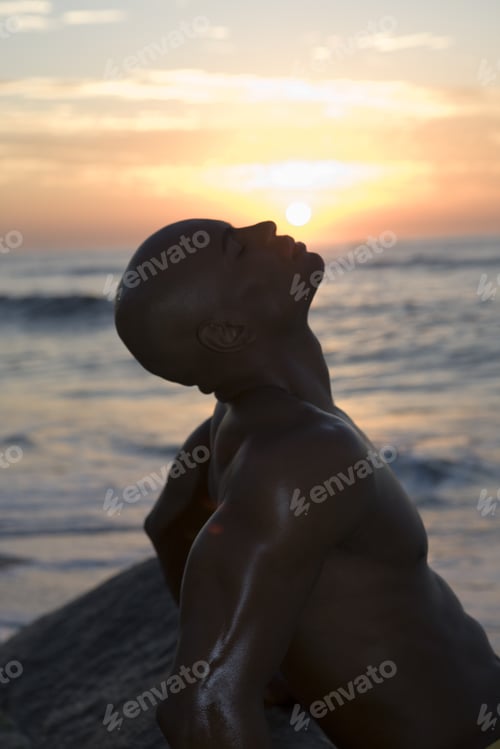 Preview: African Man At Beach During Sunset