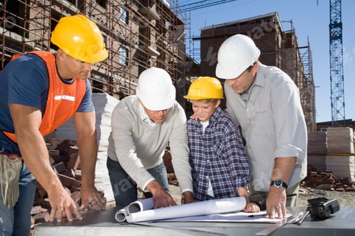 Preview: Foreman, Co-Workers And Boy Looking At Blueprints On Construction Site