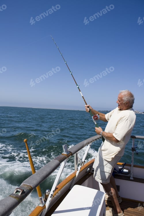 Preview: Senior Man Fishing From Boat