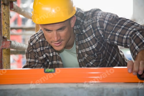 Preview: Construction Worker Looking At Level