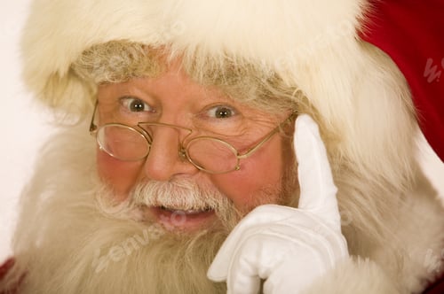 Preview: Close Up Of Santa Claus With His Finger To His Temple