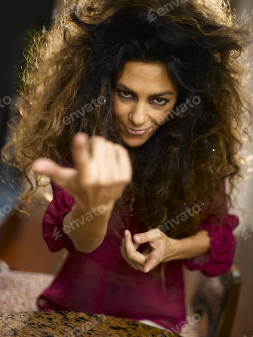 Preview: Woman With Messy Hair Pointing