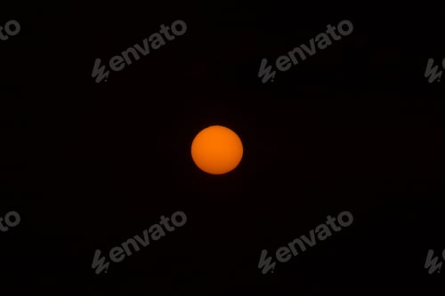 Preview: Orange Sun In The Dark Sky.