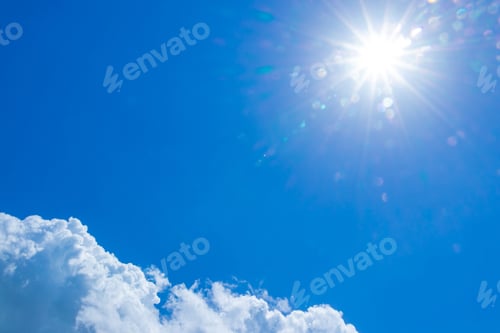 Preview: Bright Blue Sky with Clouds and Sunlight