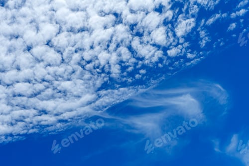 Preview: Blue Sky Background With White Clouds.