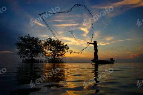 Preview: Silhouettes Fisherman Throwing Fishing Nets During Sunset, Thailand.