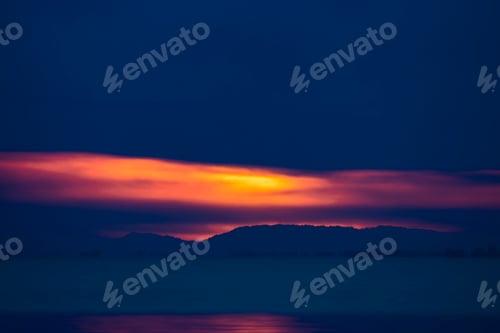 Preview: Seascape Of Sunset Sky With Clouds In Blue Hour And Empty Blue Space On Top.