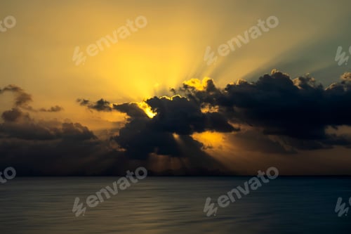 Preview: Sunset Sky At The Lake With Dark Clouds And Sunray.