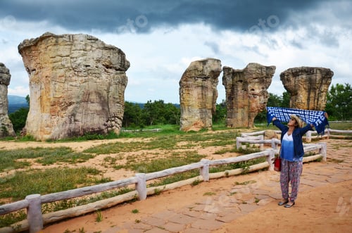 Preview: Thai Women People Travel And Posing Shooting Photo With Mor Hin Khao Or Thai Stonehenge In The Phu