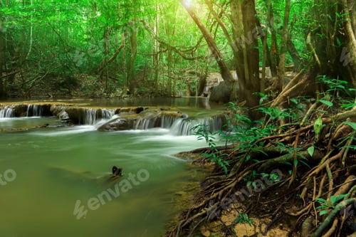Preview: Motion Water Of Small Waterfall In The Forest. At National Park.