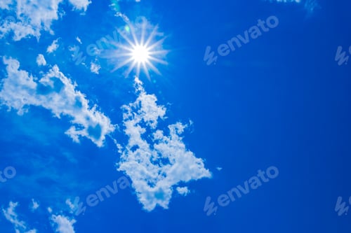 Preview: Blue Sky with Fluffy Clouds and Bright Sun
