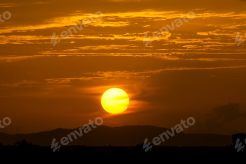 Preview: Silhouette Landscape Of Sunset Sky With Big Sun And Cloud. The Travel In Thailand.