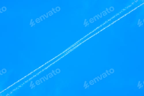 Preview: White Contrail Cloud On The Blue Sky.