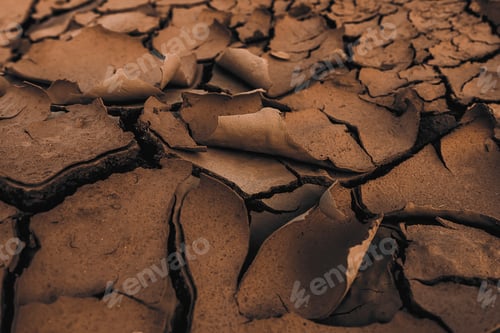 Preview: Close Up Dry Soil In Dark Brown Background.
