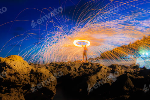 Preview: A Ring Of Fire Spinning Steel Wool On The Rock And Beach, Showers Of Hot Glowing Sparks From