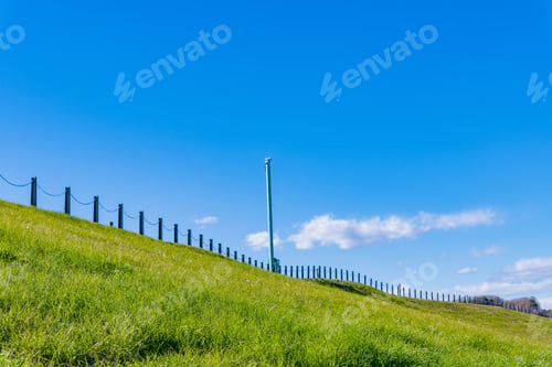 Preview: Levee Grassland And Winter Blue Sky