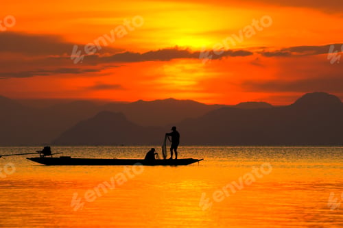 Preview: Silhouettes Of Fisherman At The Lake With Sunset, Thailand.