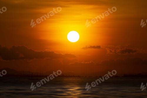 Preview: Sunset Sky With Cloud And Silhouette Mountain At The Lake In Golden Time.
