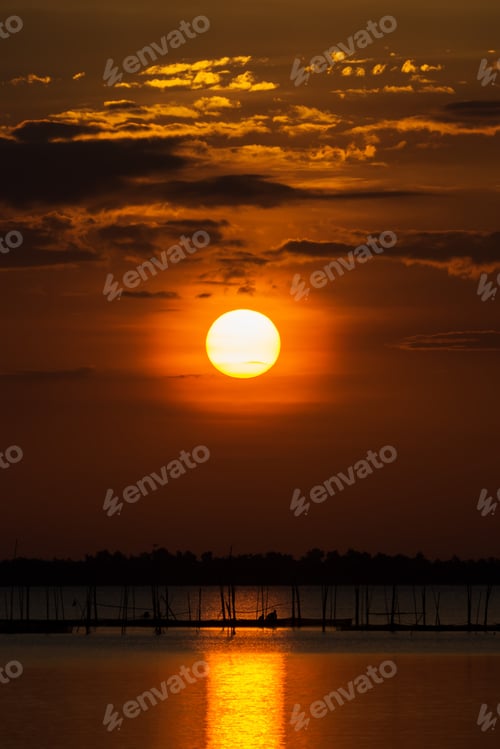 Preview: Sunset Reflecting On The Water At The Lake.