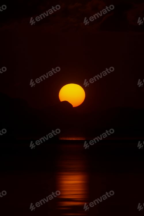Preview: Sunset Sky With Silhouette Mountain At The Lake.