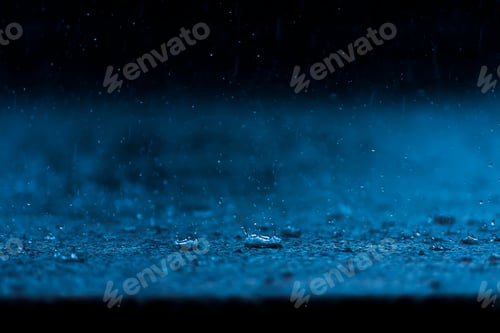 Preview: Rain Fall On The Ground In Rains Season With Blur Background.