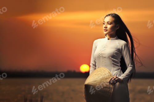 Preview: Portrait Of Beautiful Asian Girls With Ao Dai Vietnam Traditional Dress On Sunset Landscapes.