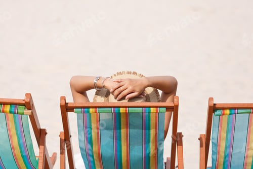 Preview: Woman On Beach Chair Looking At Sea