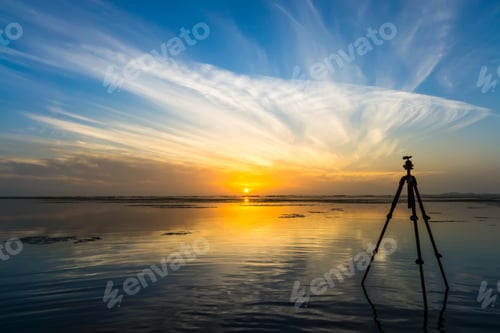 Preview: Tripod On The Beach With Sunrise Sky.