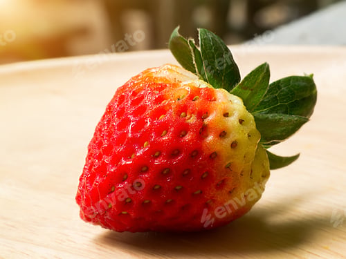 Preview: Close Up Of Strawberry On Wood.