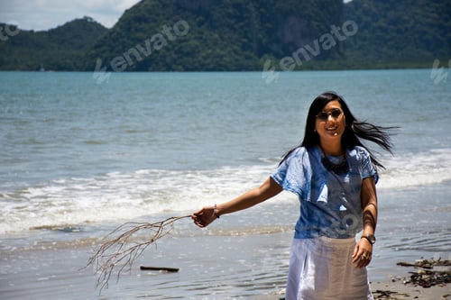 Preview: Traveler Thai Women Relax On The Beach And Portrait Posing For Take Photo With Wave Water Of Sea