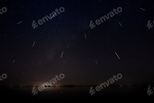 Preview: The Sky With Meteor And Stars Dust At The Lake In The Dark Night.