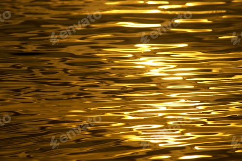 Preview: Defocus Water Surface Images Reflect The Sunlight At The Lake In Golden Time.