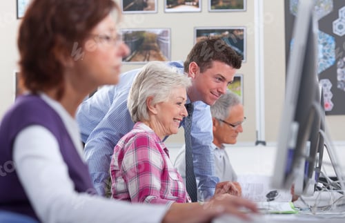 Preview: A Side Profile Medium Shot A Happy Young Teacher Talking To A Senior Woman With Gray Hair In A