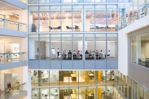 Preview: An Extreme Wide View Of Businesswomen And Businessmen Having An Important Meeting In A Conference