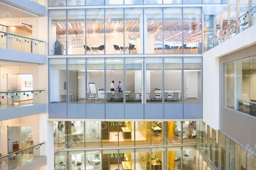 Preview: An Extreme Wide View Of Businessmen Shaking Hands In The Conference Room Seen Through The Glass