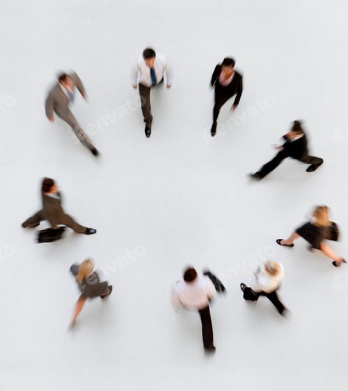 Preview: Overhead Shot Of Motion Blur Of Businesspeople In A Ring Walking Towards The Center.