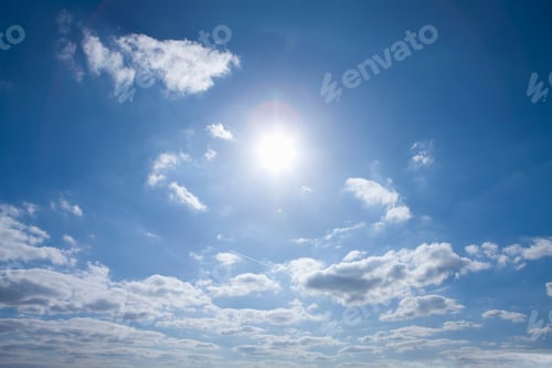 Preview: Blue Sky with Clouds and Sunlight Burst