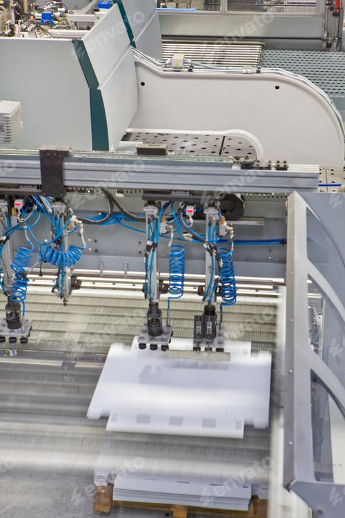Preview: A Close Up Portrait Shot Of A Machinery Manufacturing Aluminum Light Fittings In A Factory.