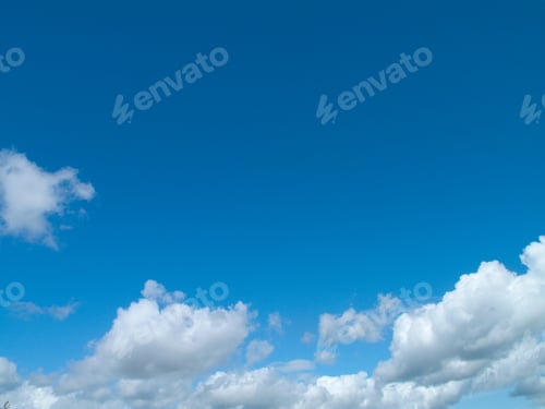 Preview: A Low Angles Shot Of Clouds In Sunny Blue Sky.
