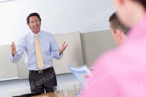 Preview: A Tilted View Of A Smart Businessman Leading A Meeting In The Conference Room