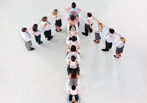 Preview: Horizontal Overhead Shot Of Businesspeople Standing In Formation Of An Upward Arrow With Hands On