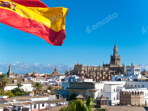 Preview: Spanish Flag Fluttering With Cathedral In Background, Seville, Spain