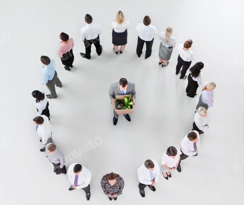 Preview: Overhead Shot Of A Fired Businessman Holding A Cardboard Box With His Belongings Surrounded By His