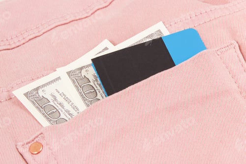 Preview: Money And Credit Card In Pocket Of Pink Trousers. Finance And Banking Concept