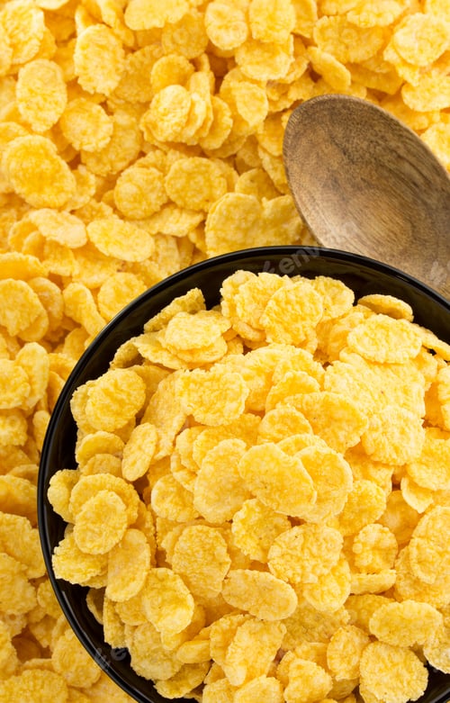 Preview: Corn Flakes In Bowl As Background Texture