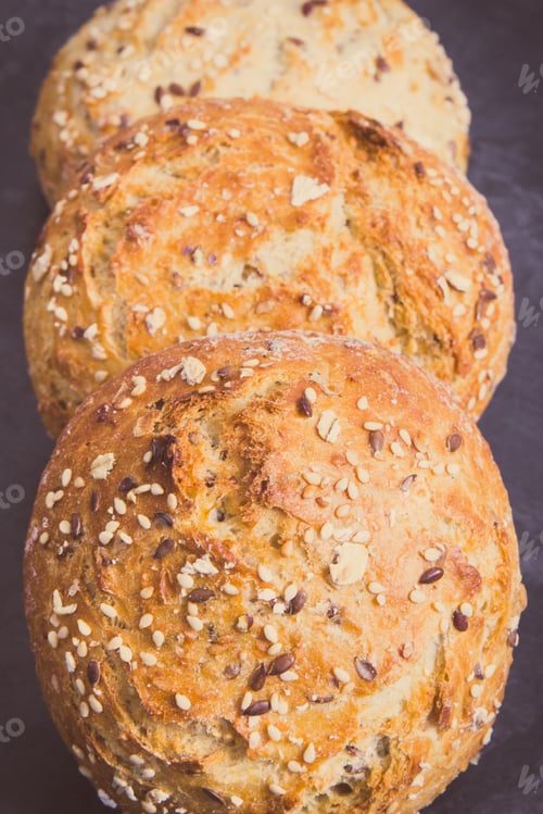Preview: Fresh Baked Wholegrain Rolls Or Bread For Breakfast. Vintage Photo