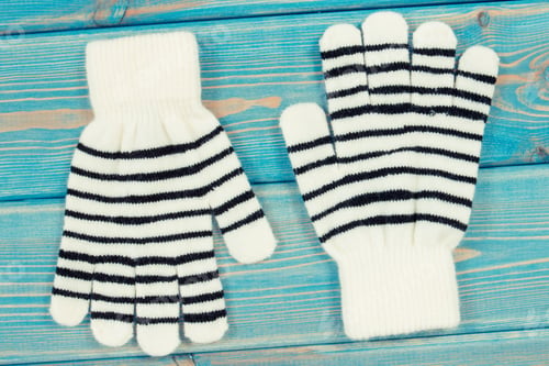 Preview: Black And White Gloves For Woman Made Of Cotton Or Wool On Blue Boards, Warm Clothing For Autumn Or