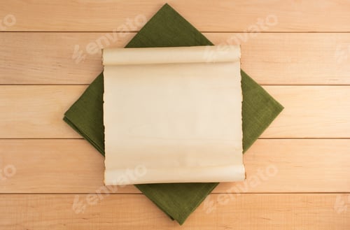 Preview: Parchment And Napkin On Wooden Background
