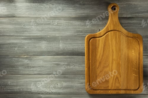 Preview: Cutting Board At Wooden Table Surface